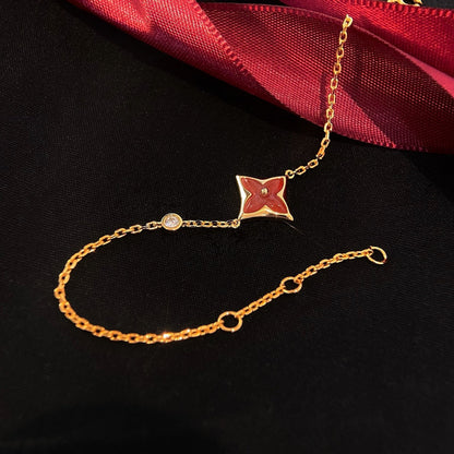 [BLAUE TRÄNEN] ARMBAND AUS ROTGOLD MIT DIAMANTEN UND KARNEOL