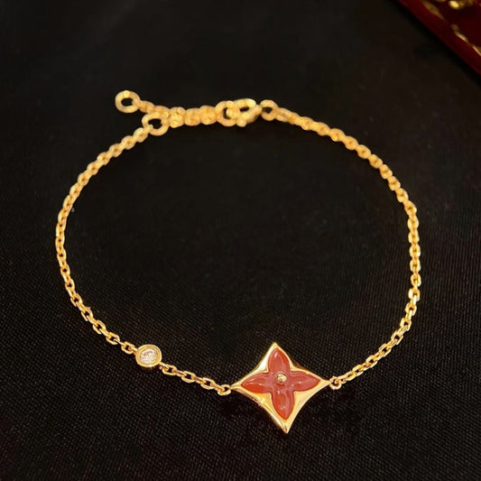 [BLAUE TRÄNEN] ARMBAND AUS ROTGOLD MIT DIAMANTEN UND KARNEOL
