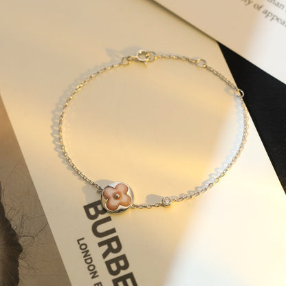 [BLAUE TRÄNEN]SILBERARMBAND MIT SONNENMOTIV UND ROSA MOP