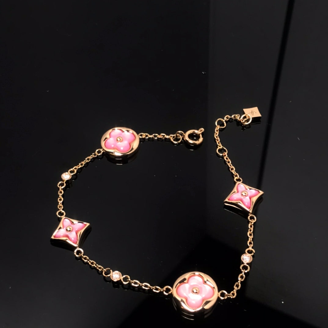 [BLAUE TRÄNEN] ARMBAND MIT 4 MOTIV-STERNEN UND SONNEN-ROSAGOLD 