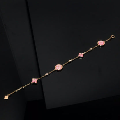 [BLAUE TRÄNEN] ARMBAND MIT 4 MOTIV-STERNEN UND SONNEN-ROSAGOLD 