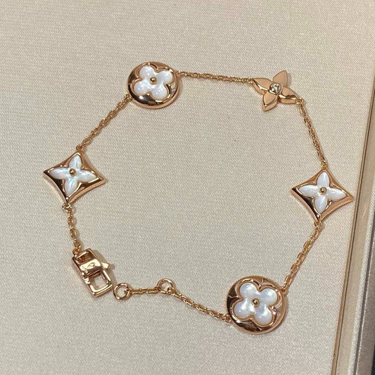 [BLAUE TRÄNEN]ARMBAND AUS ROTGOLD MIT 5 MOTIV „STERN UND SONNE“