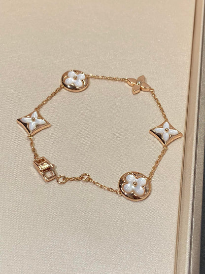 [BLAUE TRÄNEN]ARMBAND AUS ROTGOLD MIT 5 MOTIV „STERN UND SONNE“