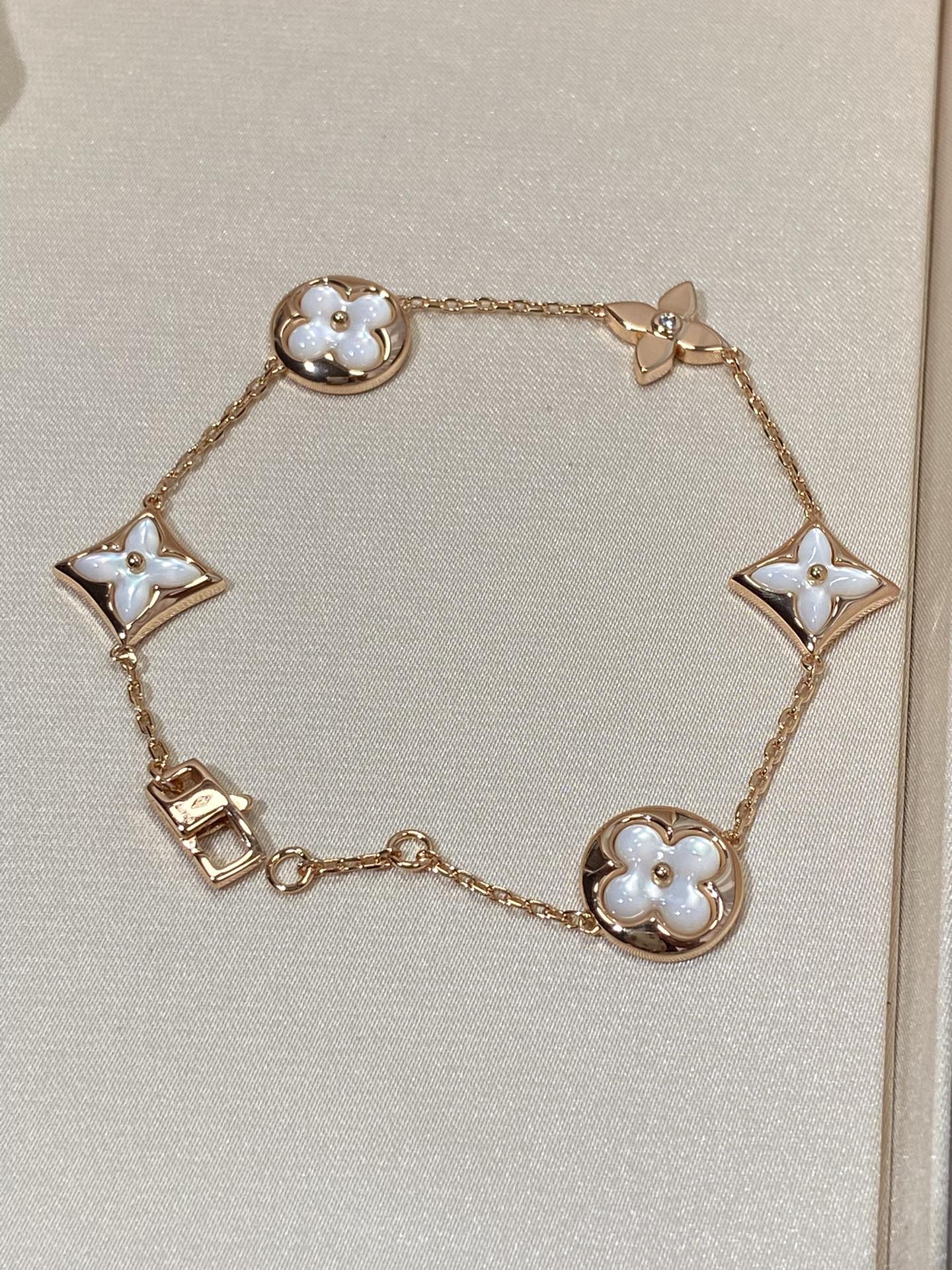 [BLAUE TRÄNEN]ARMBAND AUS ROTGOLD MIT 5 MOTIV „STERN UND SONNE“