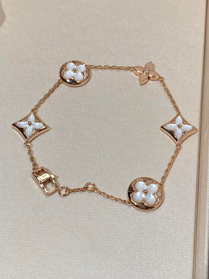 [BLAUE TRÄNEN]ARMBAND AUS ROTGOLD MIT 5 MOTIV „STERN UND SONNE“