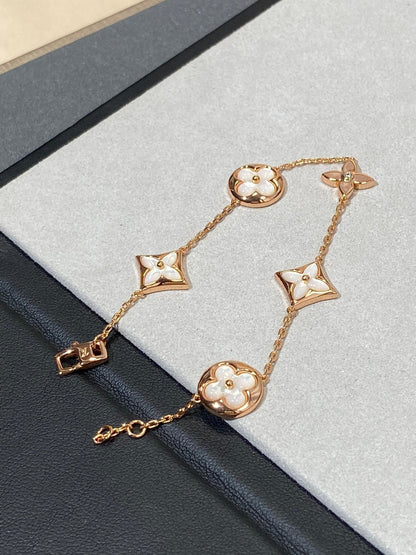 [BLAUE TRÄNEN]ARMBAND AUS ROTGOLD MIT 5 MOTIV „STERN UND SONNE“