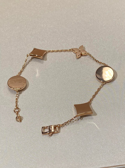 [BLAUE TRÄNEN]ARMBAND AUS ROTGOLD MIT 5 MOTIV „STERN UND SONNE“