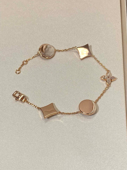 [BLAUE TRÄNEN]ARMBAND AUS ROTGOLD MIT 5 MOTIV „STERN UND SONNE“