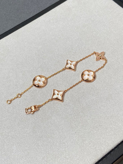 [BLAUE TRÄNEN]ARMBAND AUS ROTGOLD MIT 5 MOTIV „STERN UND SONNE“