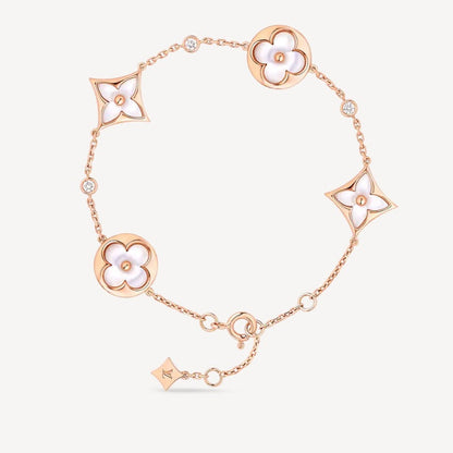 [BLAUE TRÄNEN] ARMBAND MIT 4 MOTIV-STERNEN UND SONNEN, WEISSEM MOP-ROSÉGOLD 