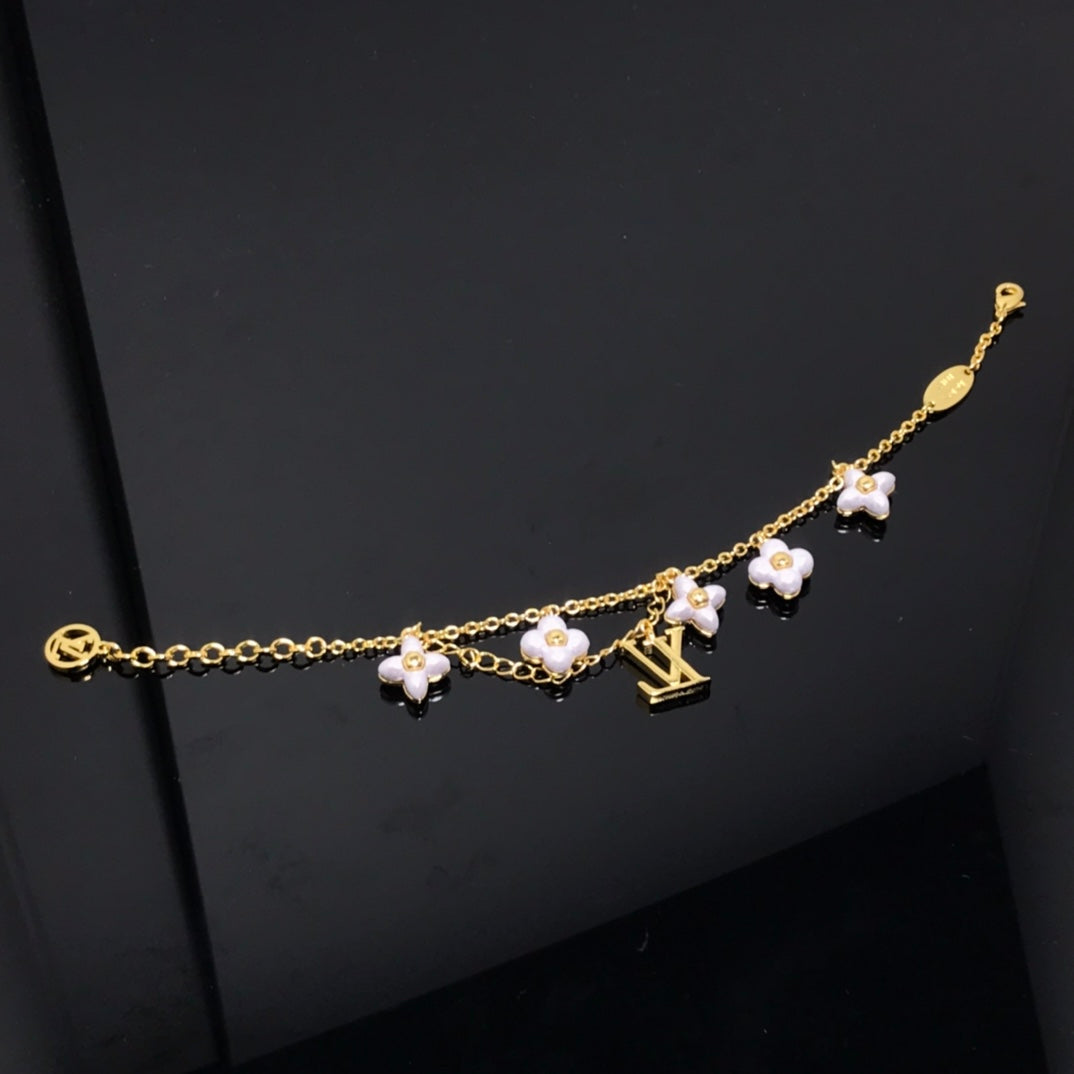 [BLUE TEARS]ロゴ6モチーフ スター＆サン ゴールドブレスレット