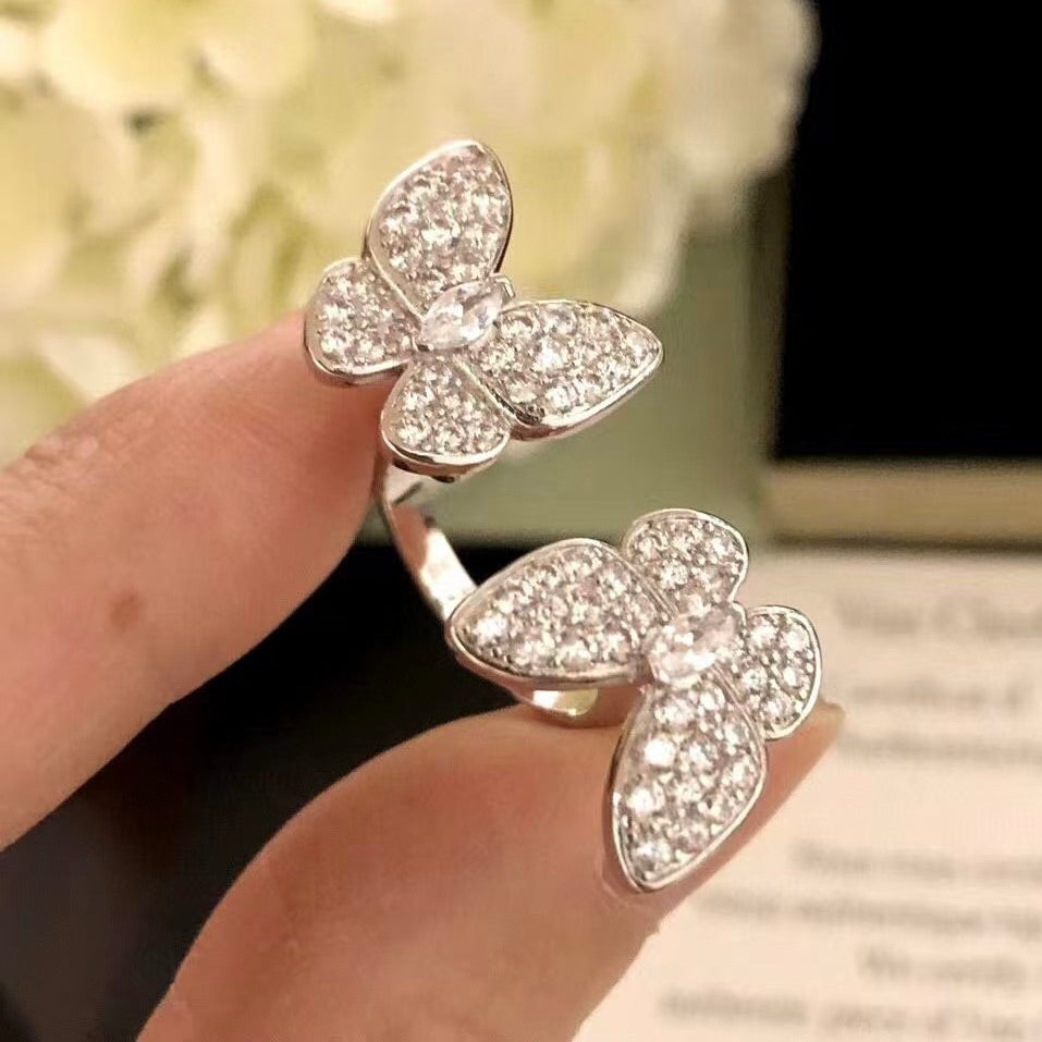 [BLAUE TRÄNEN]ZWILLINGS-DIAMANTRING AUS SILBER MIT SCHMETTERLING
