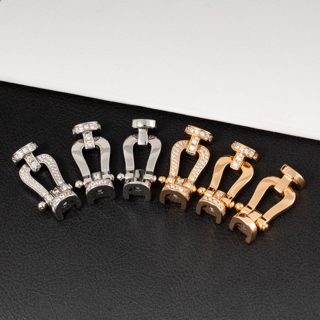[BLAUE TRÄNEN]FORCE GROSSES HUFEISENARMBAND MIT DIAMANTEN IN GOLD