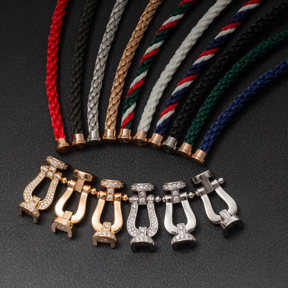 [BLAUE TRÄNEN]FORCE GROSSES HUFEISENARMBAND MIT DIAMANTEN IN GOLD
