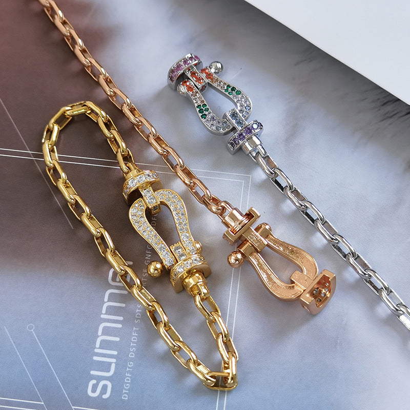 [BLAUE TRÄNEN]FORCE GROSSES METALLARMBAND MIT HUFEISENVERSCHLUSS