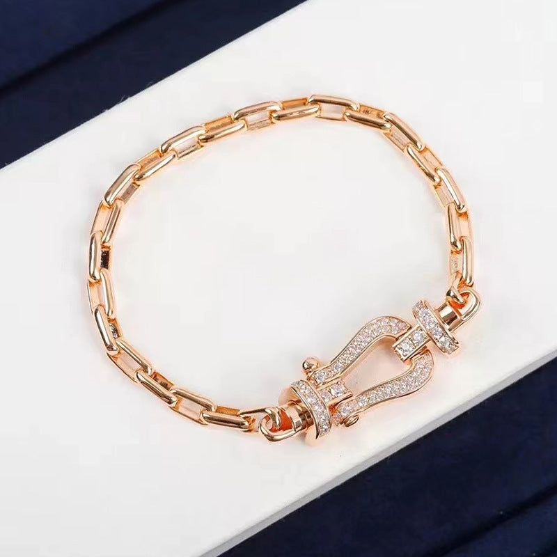 [BLAUE TRÄNEN]FORCE GROSSES METALLARMBAND MIT HUFEISENVERSCHLUSS