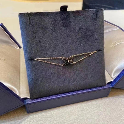 [BLAUE TRÄNEN]JEUX ARMBAND ONYX ROTGOLD 1 DIAMANT