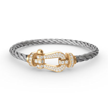 [BLAUE TRÄNEN]FORCE GROSSES HUFEISENARMBAND MIT DIAMANTEN IN GOLD