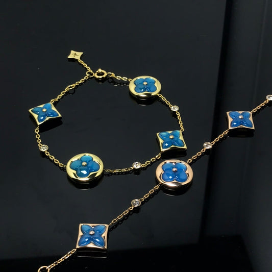 [BLAUE TRÄNEN] BLAUES ARMBAND MIT STERNEN- UND SONNENMOTIV 4