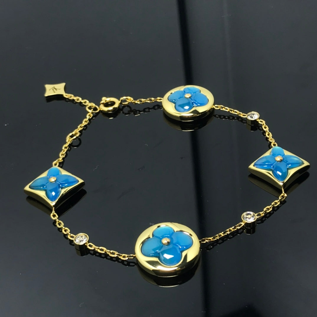 [BLAUE TRÄNEN] BLAUES ARMBAND MIT STERNEN- UND SONNENMOTIV 4