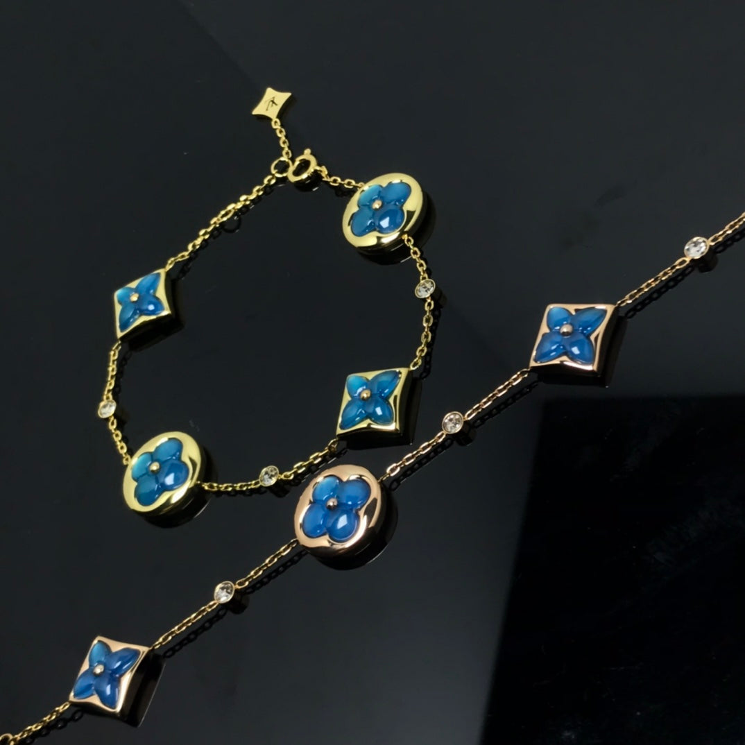 [BLAUE TRÄNEN] BLAUES ARMBAND MIT STERNEN- UND SONNENMOTIV 4
